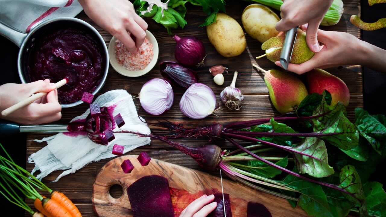 Preparing healthy vegetables on a kitchen bench