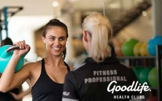 Woman at the gym smiling
