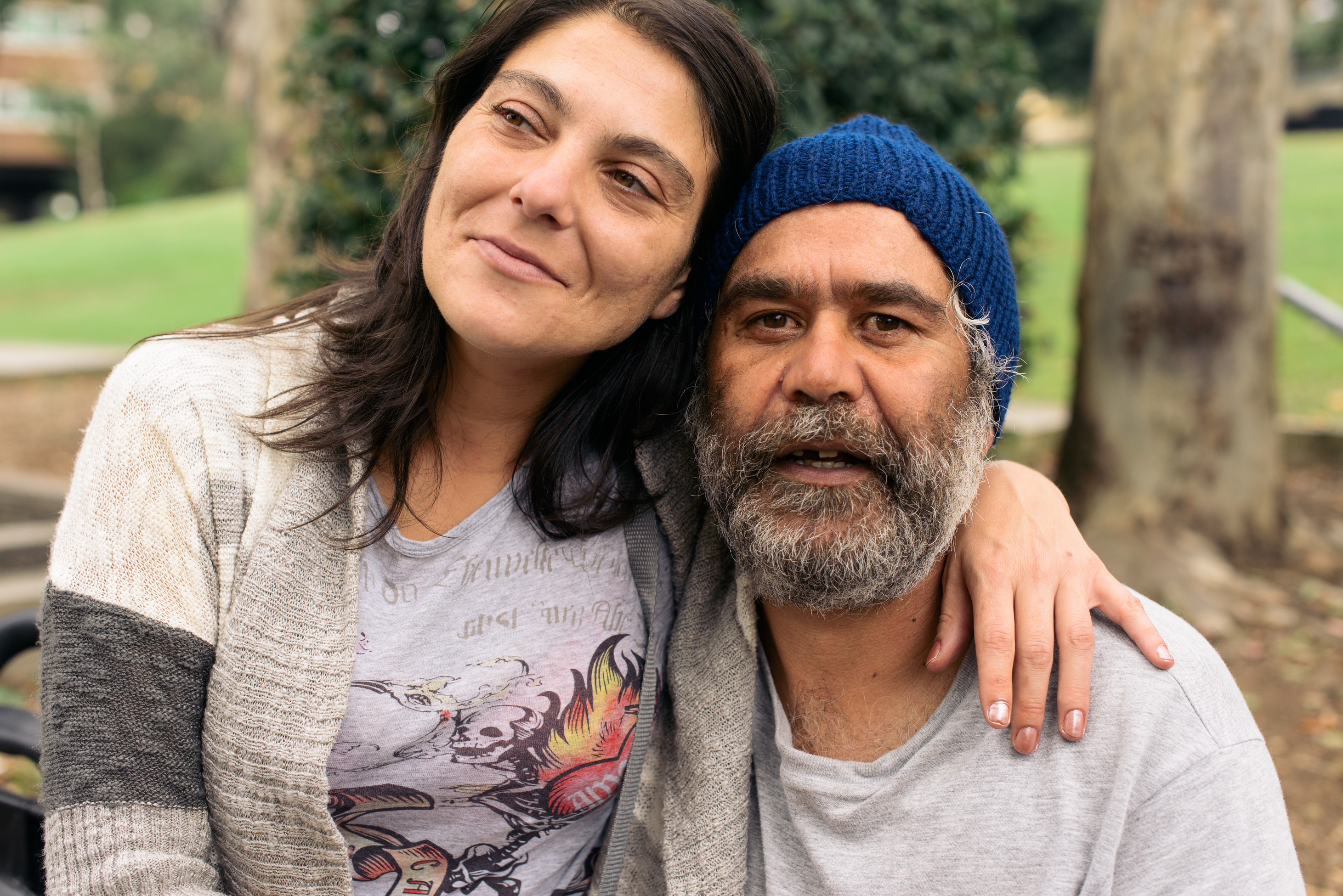 Greek Woman with Arm around Aboriginal Man