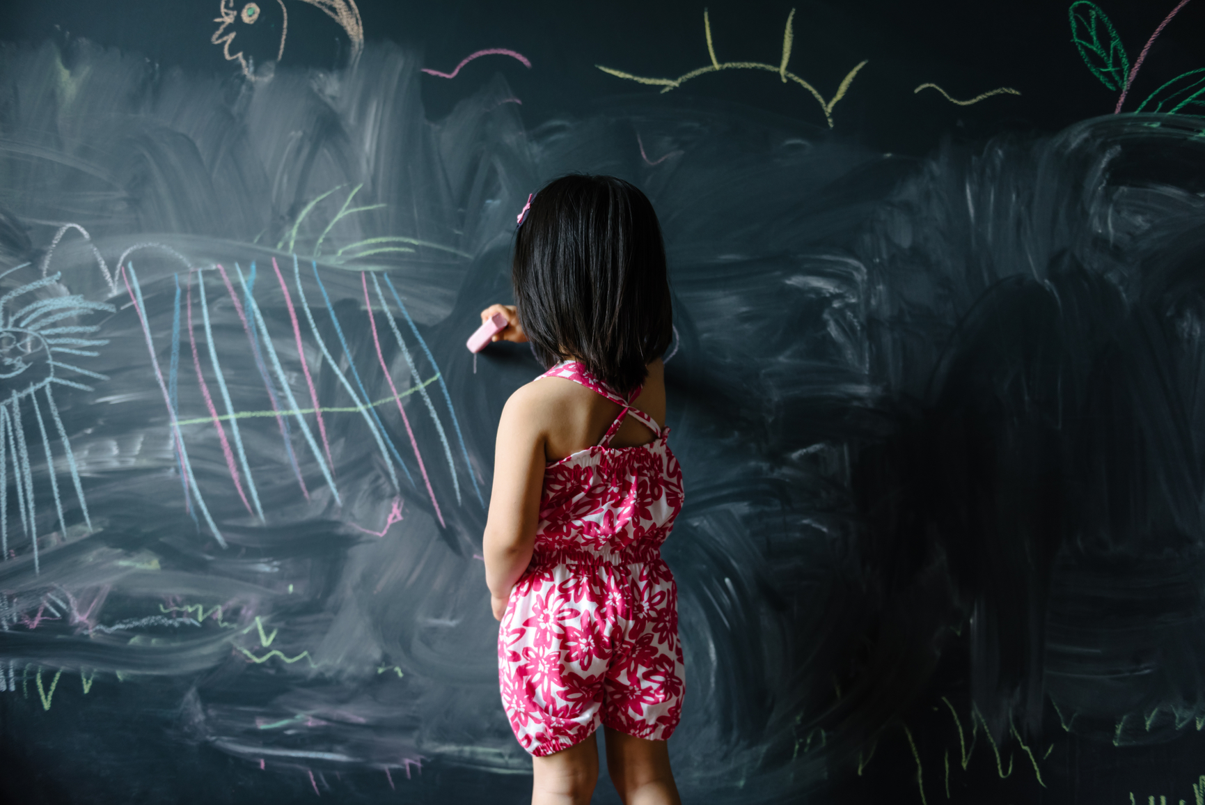 Toddler Girl Drawing On Blackboard Wall Toddler Girl Drawing On Blackboard Wall