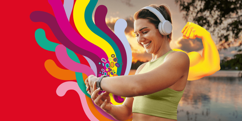 Girl wearing headphones and checking her smart watch
