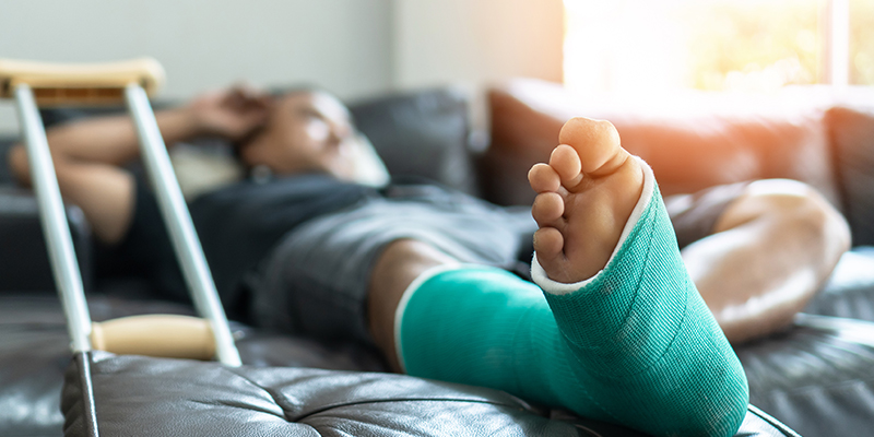Image of person with leg in cast and crutches Image of person with leg in cast and crutches