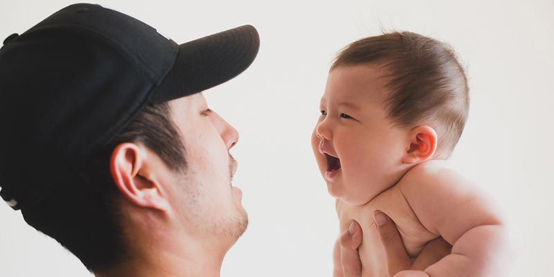 A dad and his baby A dad and his baby