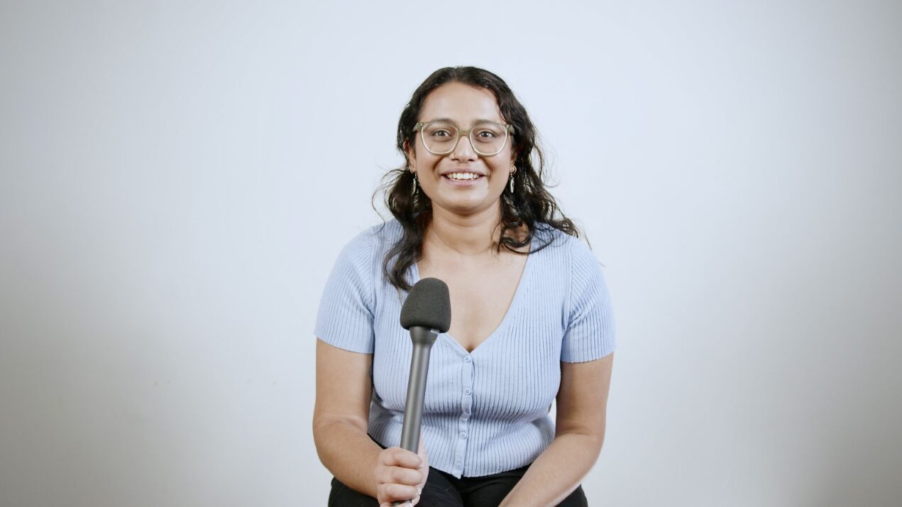 Girl holding a mic
