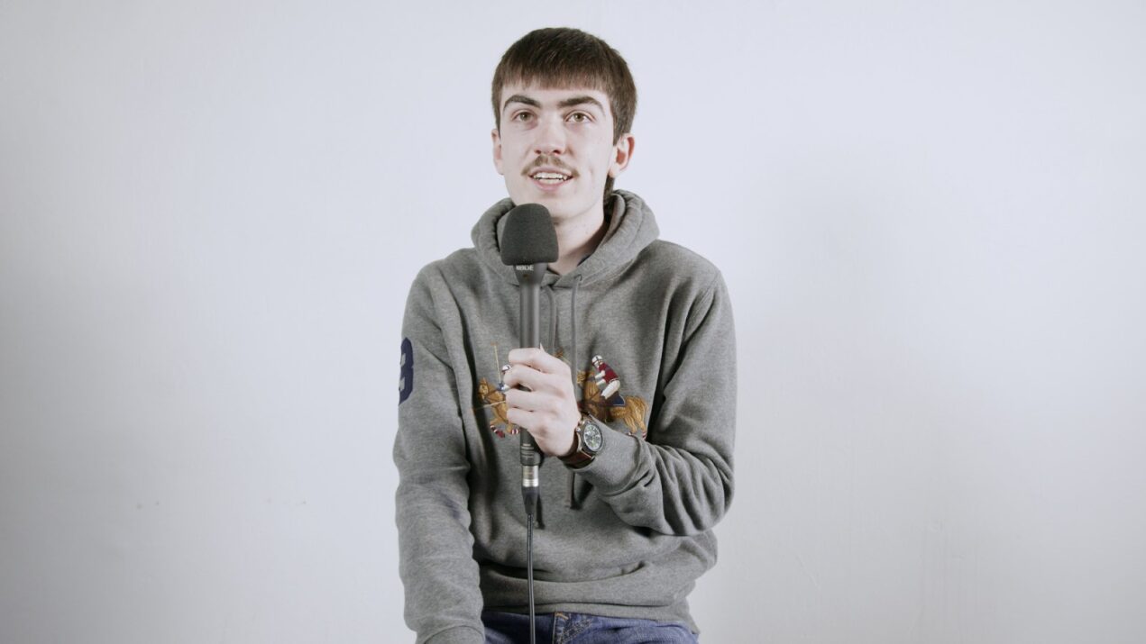 Man holding a mic