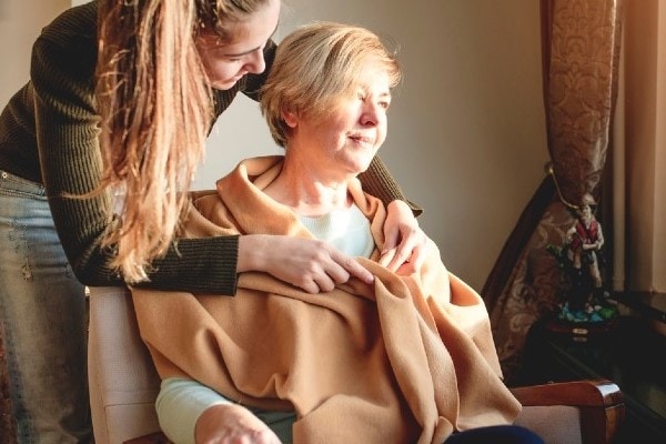 close up of palliative care patient being cared for